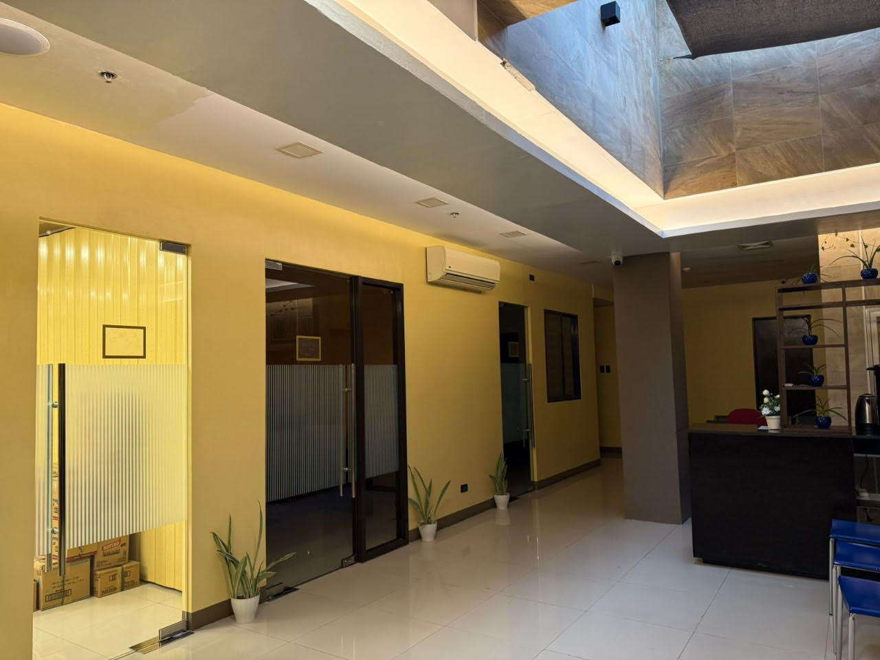 Clean and professional hallway corridor inside Al Assal Manpower recruitment agency office in Philippines