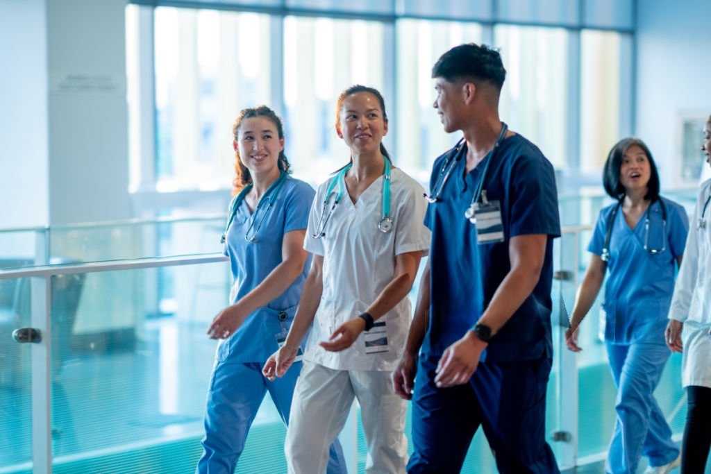 A group of dedicated healthcare workers in a professional hospital setting, highlighting the opportunities in the medical and nursing fields